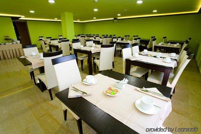 Royal Nayef Hotel Portonovo Restaurant foto